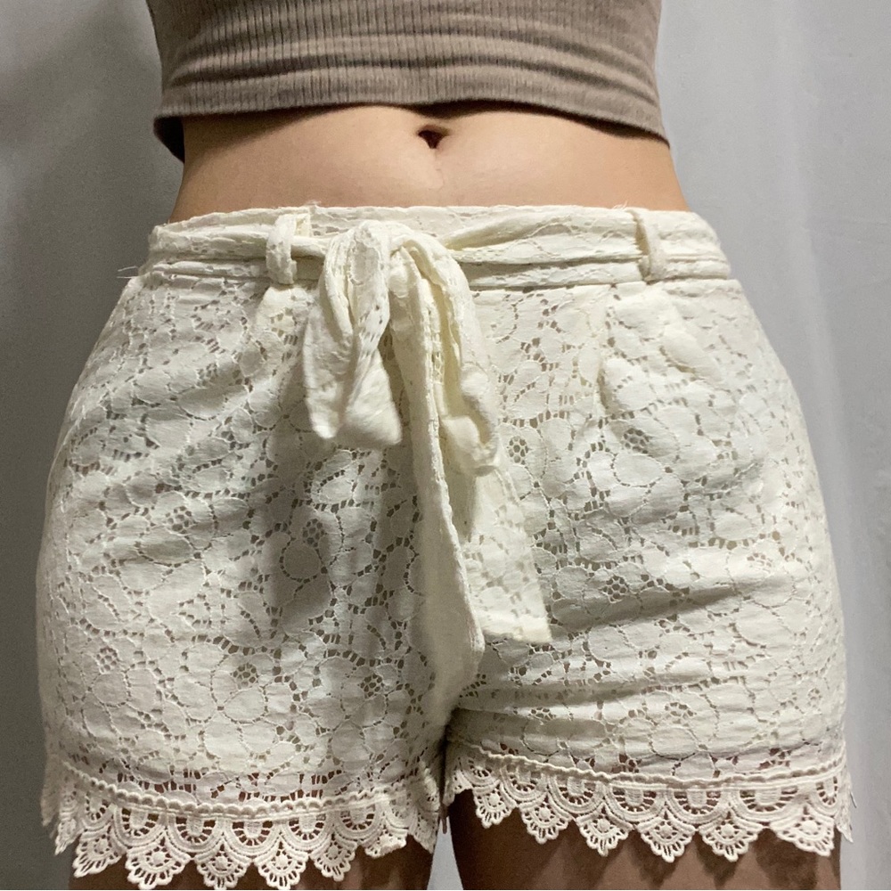 Dress shorts white with floral design. Size small